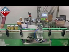 Machine automatique d' étiquetage des bouteilles rondes